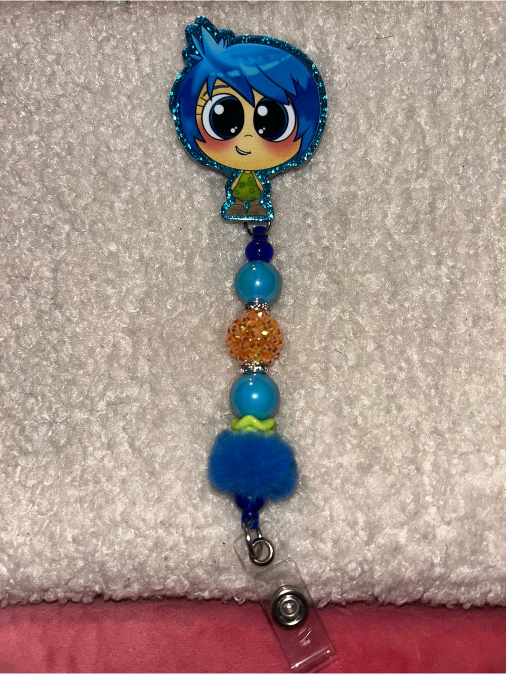 Blue Cartoon Character Beaded Badge Reel with Pom Pom Accent